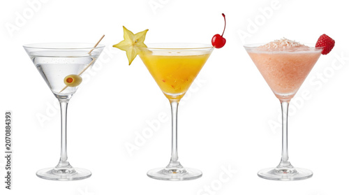 Canvas Print Three assorted cocktails in martini glasses, isolated on transparent background
