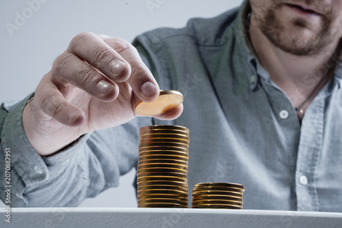 Photos Build a column or tower of coins - growth recorded