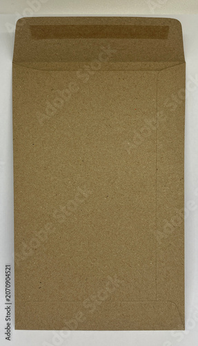 Open brown kraft paper envelope isolated on white background