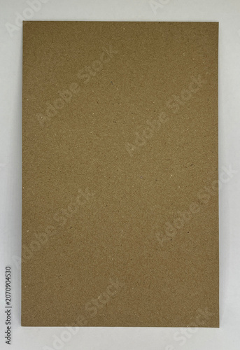 Kraft brown cardboard sheet isolated on white background