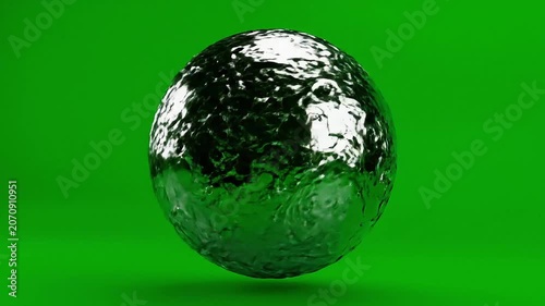 Abstract Chrome Sphere Floating and Reflecting Against Bright Green Screen Background