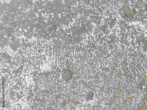 Rough Concrete Texture with Pebbles and Moss - Grunge Background