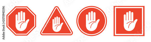 Fotografie Stop Sign Variety: A collection of four distinct red stop signs, each featuring a white open hand symbol, conveying a universal message of halt and caution