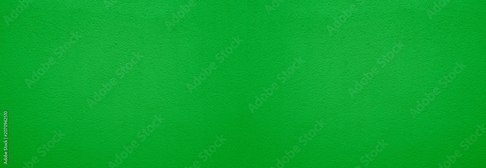 Fototapeta premium Textured background. Decorative plaster wall, external of facade. Texture of light green stucco plaster wall of clay house structure background. clay cement texture pattern
