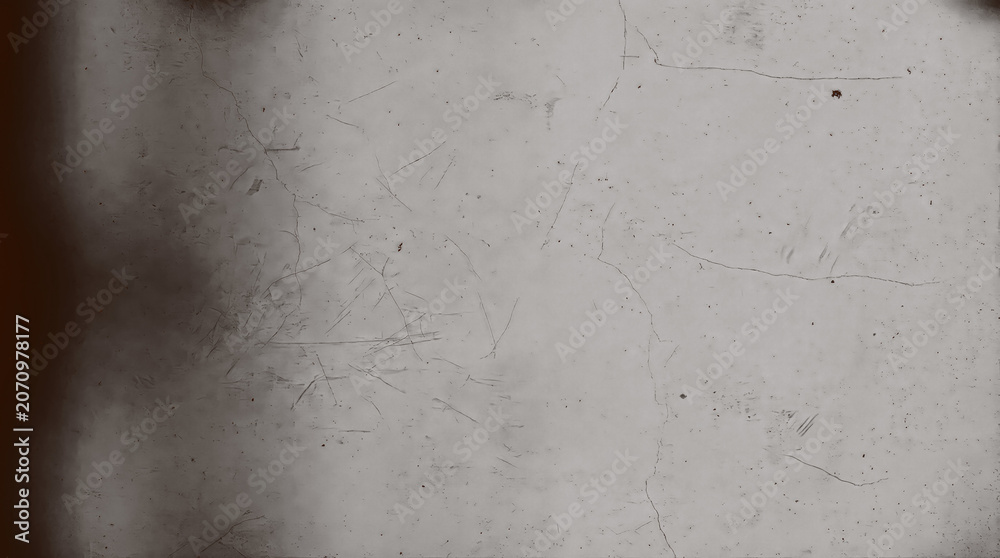 Fototapeta premium Grungy concrete wall texture with heavy scratches and dark vignette, distressed grey stone background with weathered