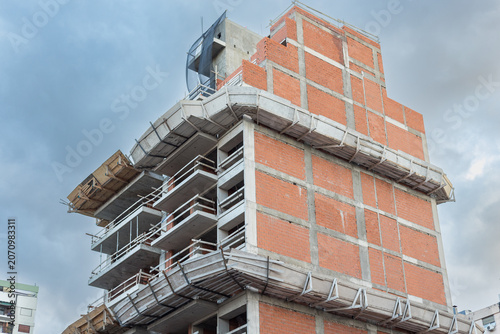 Unfinished Modern Building Under Construction with Exposed Concrete