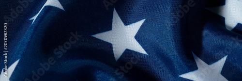 Panoramic american flag stars banner with blue textile texture