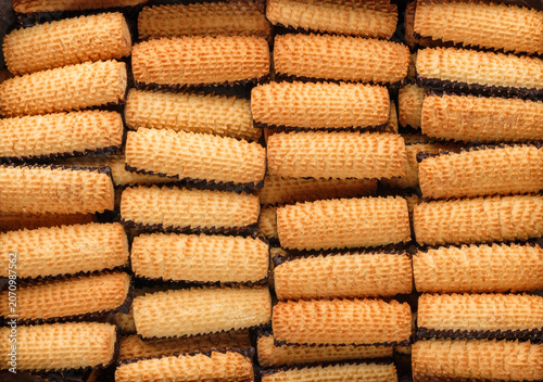 Chocolate short pastry cookies, cookie background. Sweets, dessert and pastry, close up, top view