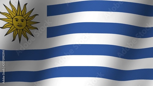 Uruguay Flag Waving: A close-up shot of the national flag of Uruguay, its distinctive blue and white stripes and the Sun of May emblem rippling gently in the breeze.