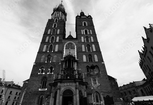  The Basilica of Saint Mary (Church of Our Lady Assumed into Heaven) is a Brick Gothic church adjacent to the Main Market Square in Kraków.