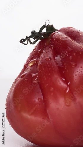 Close-up of a Fresh Tomato with Water Droplets