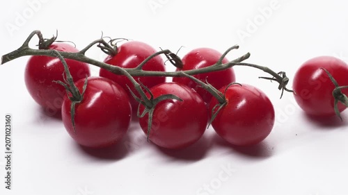 Close-up of Fresh Cherry Tomatoes on a White Background