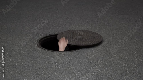 Male hand waving from inside a manhole