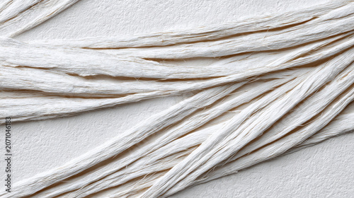 Close-up of natural linen fibers, showcasing their delicate texture and organic weave