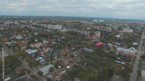 Drone pulling back over city area