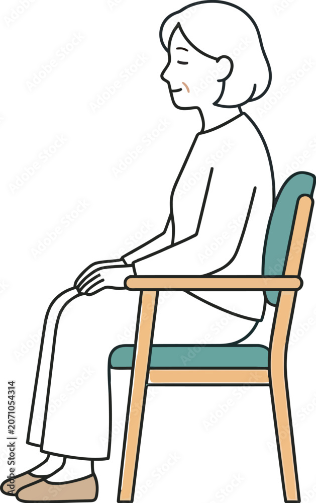 Fototapeta premium Senior woman sits calmly on a wooden armchair to illustrate a peaceful state of mind and the comfort of relaxing in a quiet home interior.