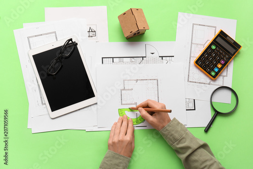 Person drawing architectura...