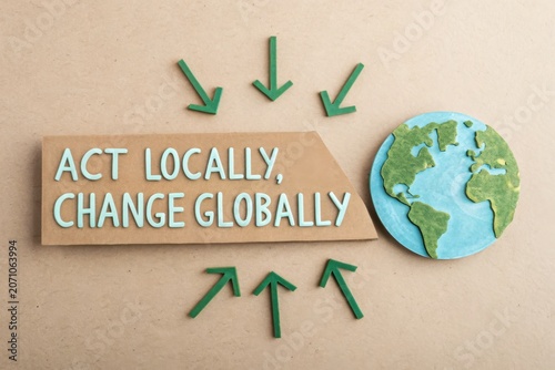 Buy Local Change Global Message with Earth and Arrows