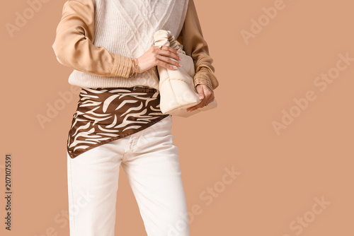 Young woman in stylish whit...