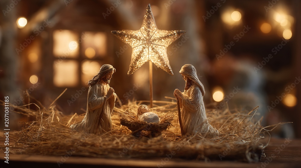 Obraz premium Christmas nativity scene with star and straw