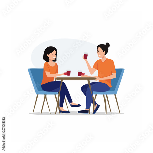 Two women sitting at a table and drinking