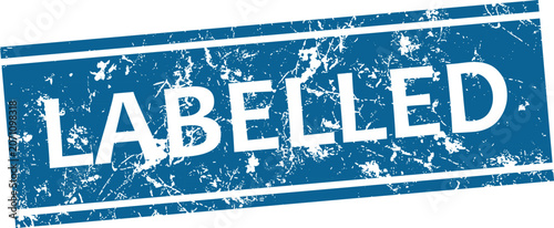 Εκτύπωση καμβά Distressed blue rubber stamp with the word 'labelled' isolated on white backgrou