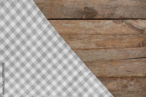 Grey checkered napkin on wo...