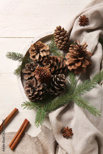 Tray with pine cones, fir b...
