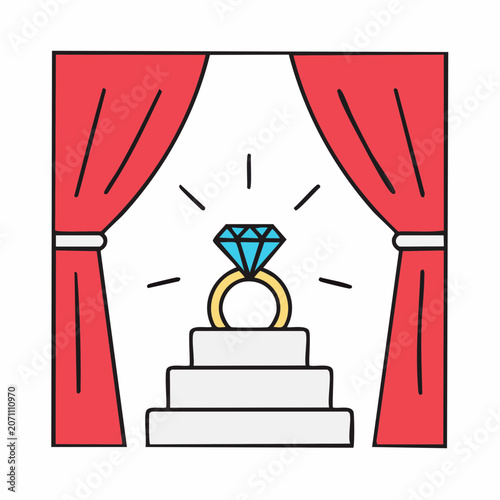 Diamond ring on stage with red curtains