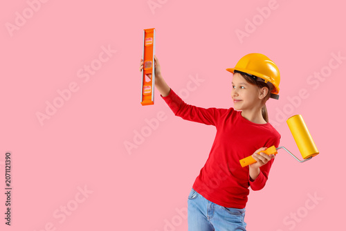Little architect with level...