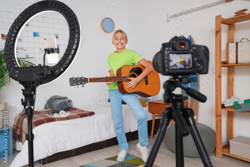 Teenage blogger with guitar...