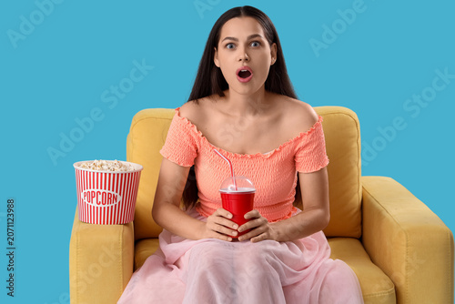 Shocked young woman in armc...