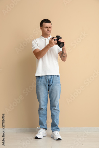Displeased male photographe...