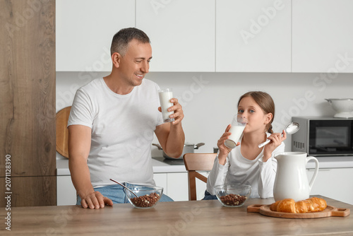 Little girl with her father...