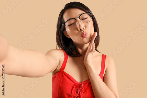 Beautiful Asian woman in st...