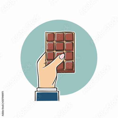 Hand holding a bar of chocolate