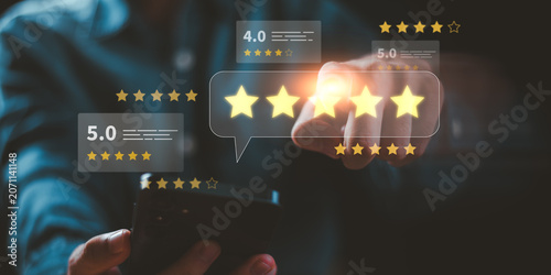 Marketing specialist analyzes customer satisfaction metrics through a five star rating system, measuring service quality, customer feedback, user experience, online reviews, client loyalty, reputation
