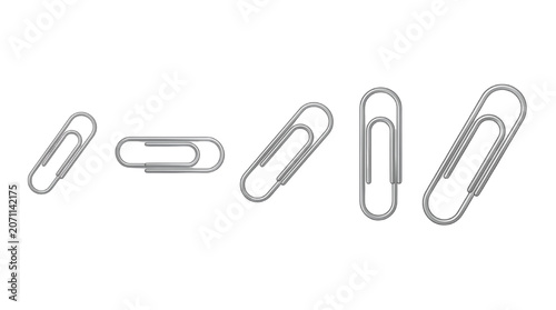 Photos Metallic silver paperclips at different angles on a white background for busines