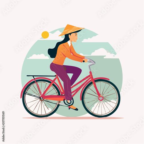 Woman in conical hat riding a bicycle outdoors
