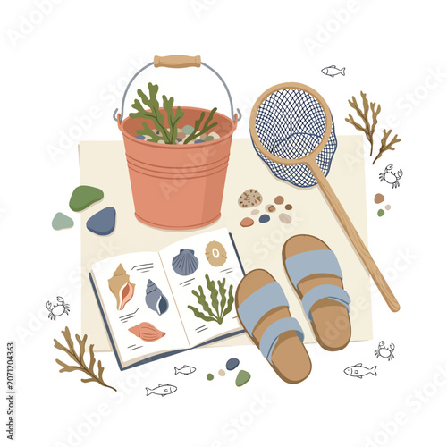 Beach items with seaweed bucket.