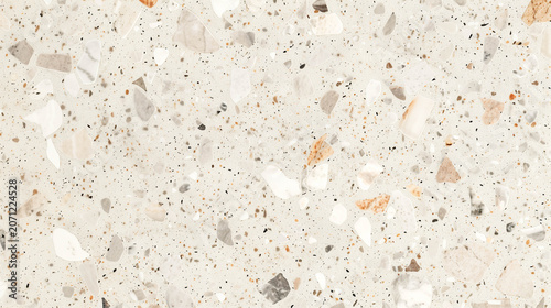 Light terrazzo surface texture with subtle stone chips creating neutral background