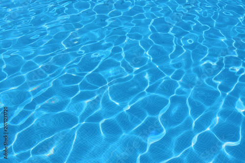 Clear Blue Swimming Pool Water with Sunlit Ripple Pattern
