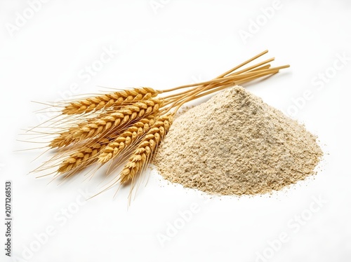 A whole wheat flour pile with golden wheat ears isolated on white background