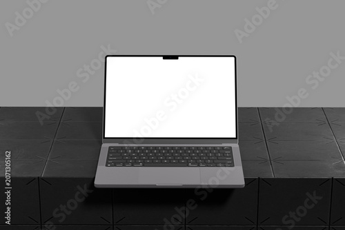 Realistic Notebook Computer Mockup on Black Geometric Platform