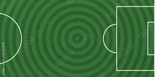Photos Top-down aerial view of a green soccer field with white markings, including the center circle, penalty areas, and goals
