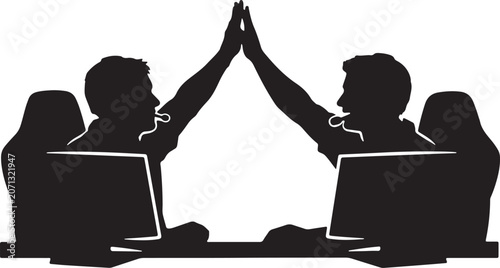 Photos silhouette of two esports teammates giving a high five after winning a match