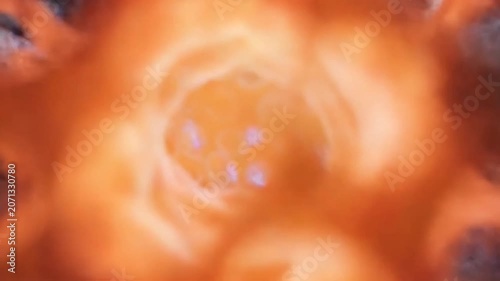 Microscopic view of biological cells connected by glowing blue electrical energy sparks and light.