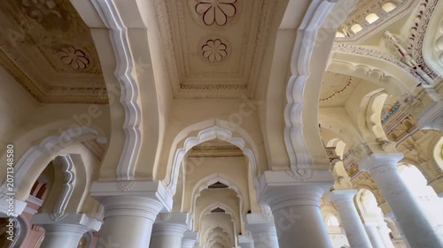 Decorative stone pillars and ornate architectural details inside Thirumalai Nayakkar Palace in Madurai, Tamil Nadu, India, showcasing the grandeur and craftsmanship of Nayak dynasty heritage