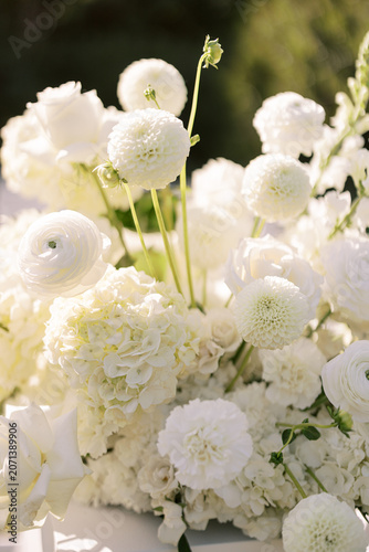 Elegant White Flowers Arrangement in Sunlight