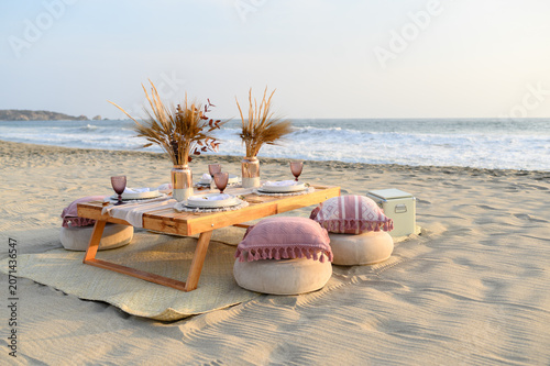 Beach picnic table setup for luxury outdoor dining